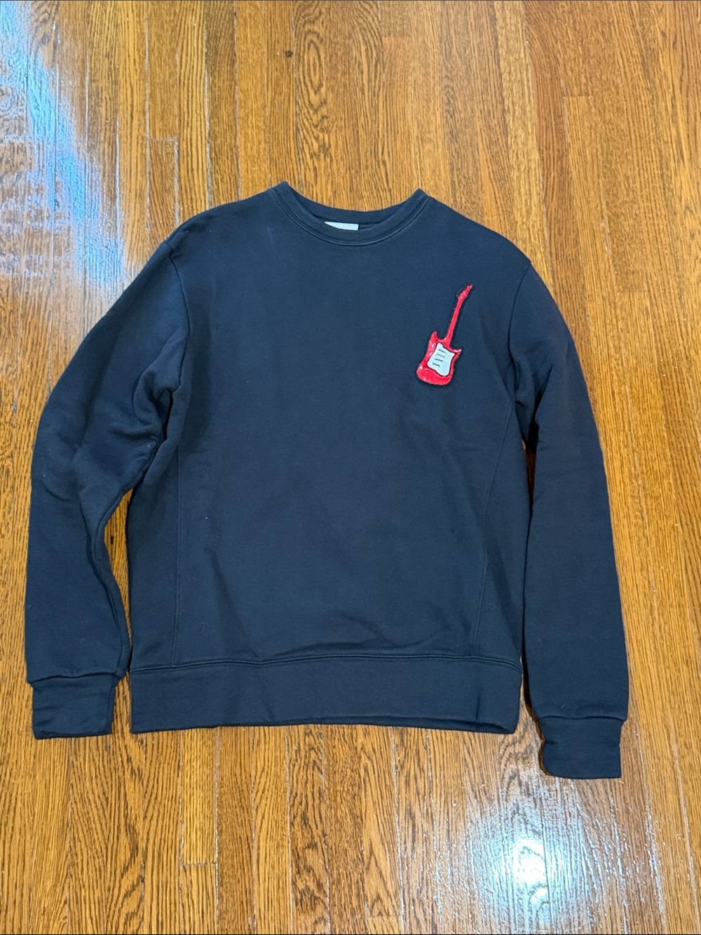 Au Jourle Jour Black Crewneck Sweater with Red Guitar Patch